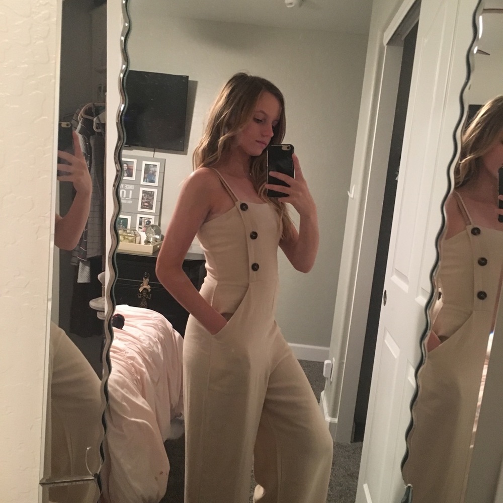 Super cute brand new tan romper from forever 21?